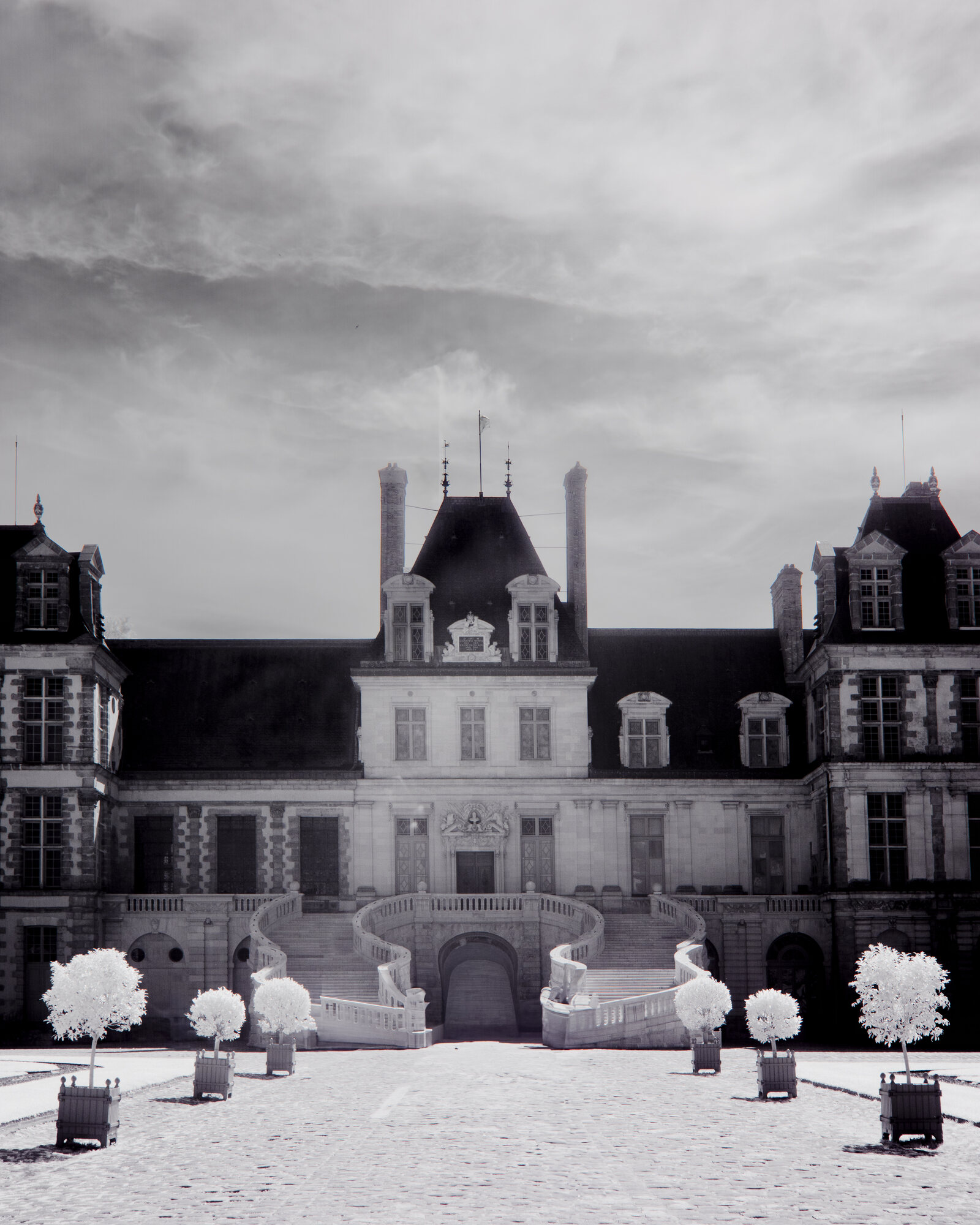 Grand horseshoe staircase at Château de Fontainebleau, black and white infrared